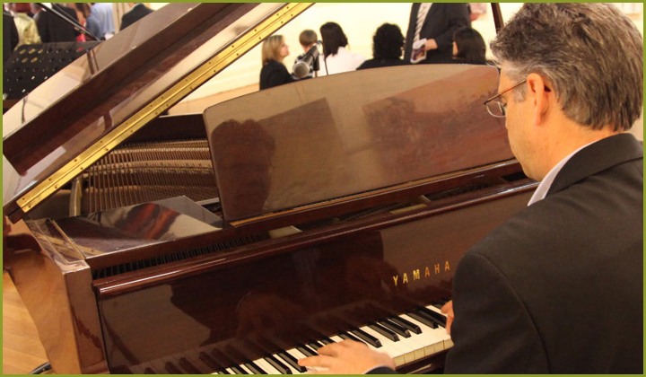 Marc performing at a corporate function